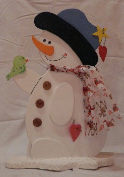 Schneemann mit Vogel